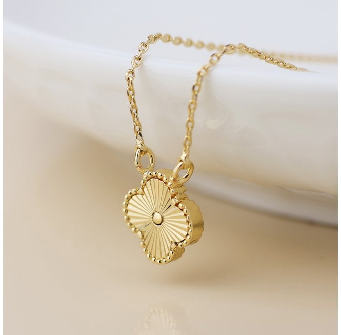 POM FAUX GOLD QUATREFOIL NECKLACE